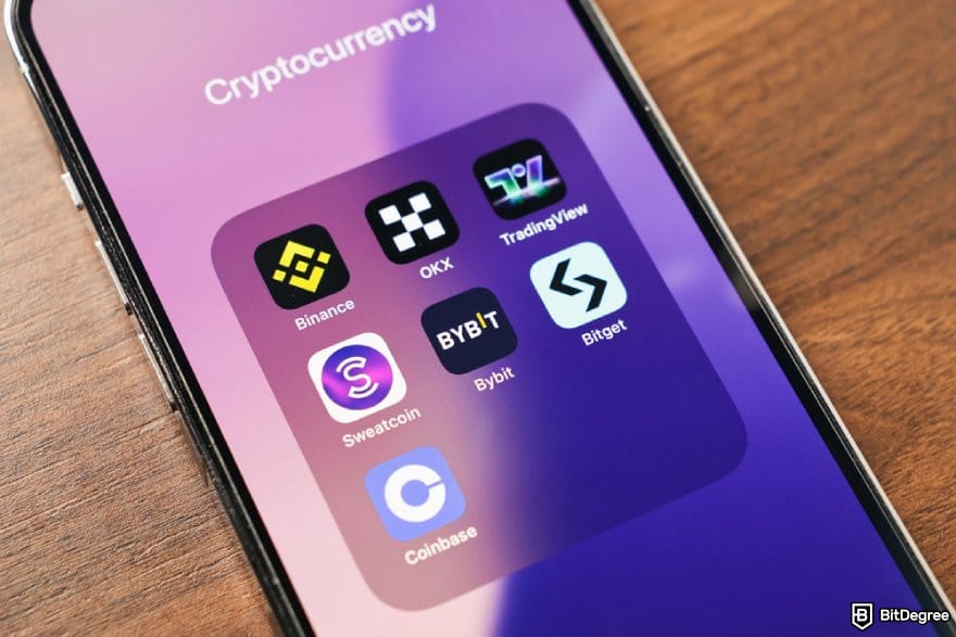 How to buy meme coins: a phone displaying some popular crypto exchange apps.