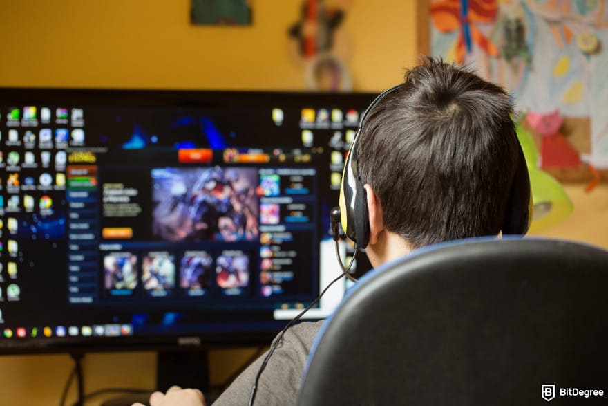 How to buy XYZVerse: a kid playing a game on the computer.
