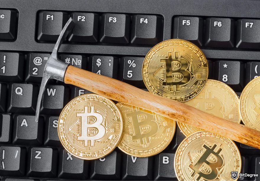 How to choose crypto trading bot: several Bitcoins on top of a keyboard.