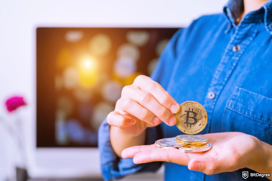 How to deposit money into crypto exchange: a person holding several crypto coins. How to deposit money into crypto exchange: a person holding several crypto coins.
