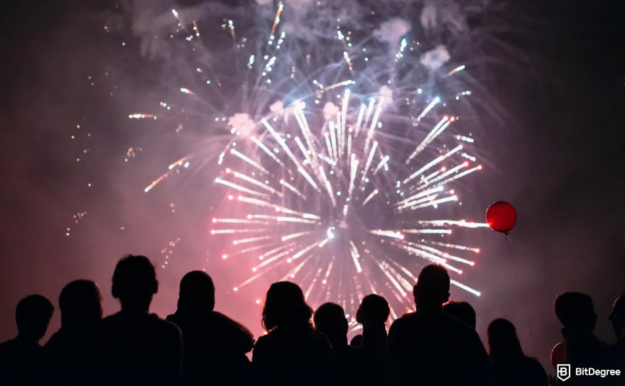 How to find meme coins early: people watching fireworks.