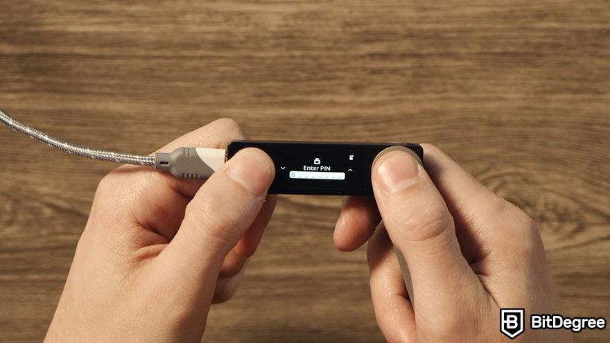 How to get a crypto wallet: Entering a new PIN for a Ledger Nano X.