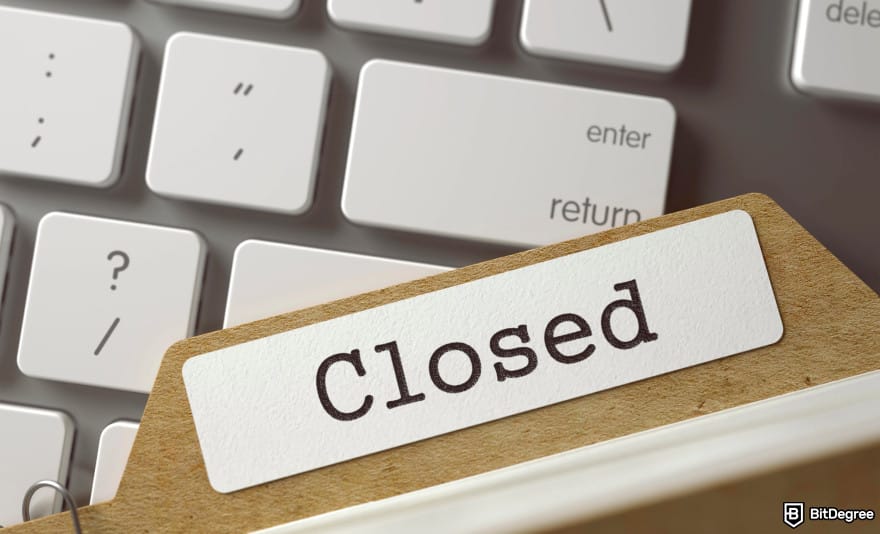 How to leverage trade crypto: a file with the label that says Closed lying on top of a keyboard.