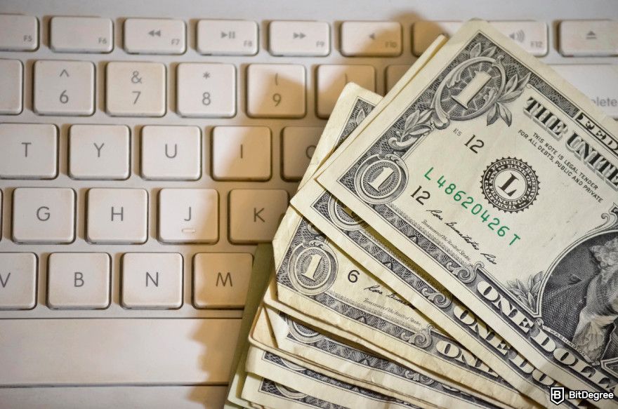 How to make passive income: money on a keyboard.
