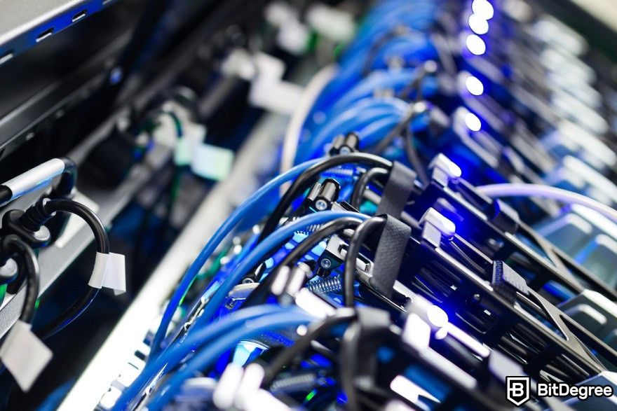 How to mine Bitcoin: Cables inside a mining rig plugged into sockets.