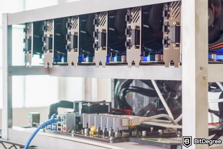 How to mine Bitcoin: Motherboards inside a mining rig on shelves.