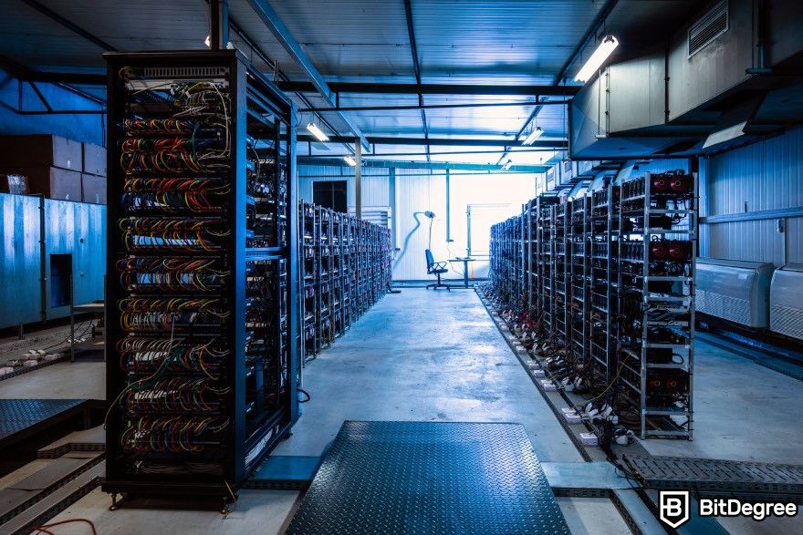 How to mine cryptocurrency: The inside look of a server room with a light on.