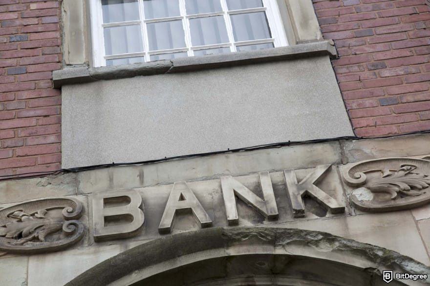 How to open a company account on OKX: close-up of a bank sign.