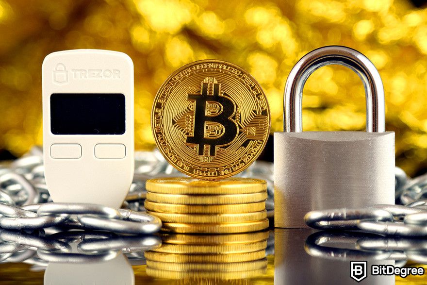 How to sell crypto from cold wallet: a Trezor hardware wallet, a Bitcoin, and a padlock on a chain.