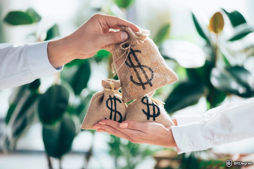 How to send money from Canada to Nigeria: two hands exchanging burlap money bags adorned with dollar signs. How to send money from Canada to Nigeria: two hands exchanging burlap money bags adorned with dollar signs.