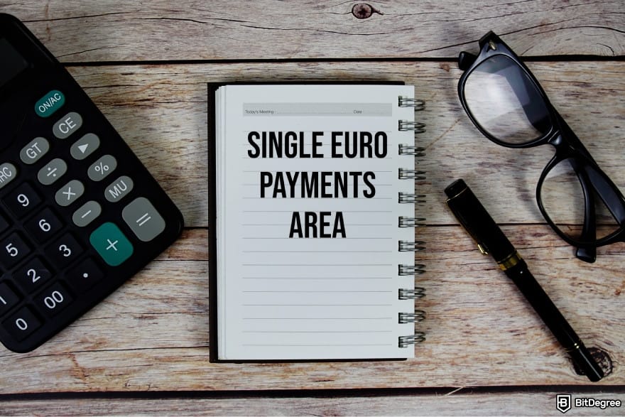 How to send money online:  notebook with the words SINGLE EURO PAYMENTS AREA on it.