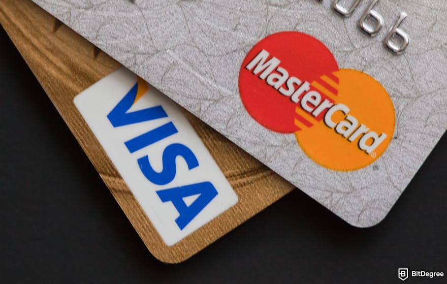 How to send money to someone without a bank account: cards with Mastercard and Visa logo to illustrate their prepaid cards.