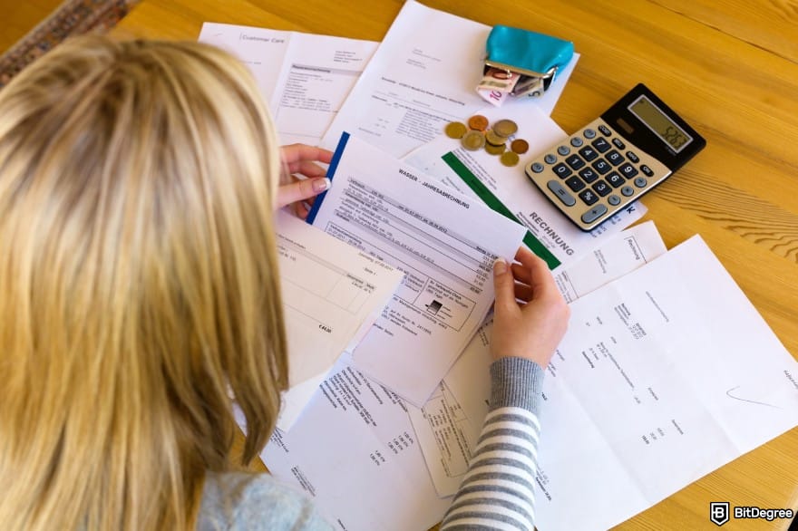 How to send money with credit card: a woman with debt and bills. How to send money with credit card: a woman with debt and bills.