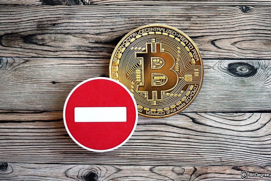 How to trade commodities: a BTC coin and a red stop sign.