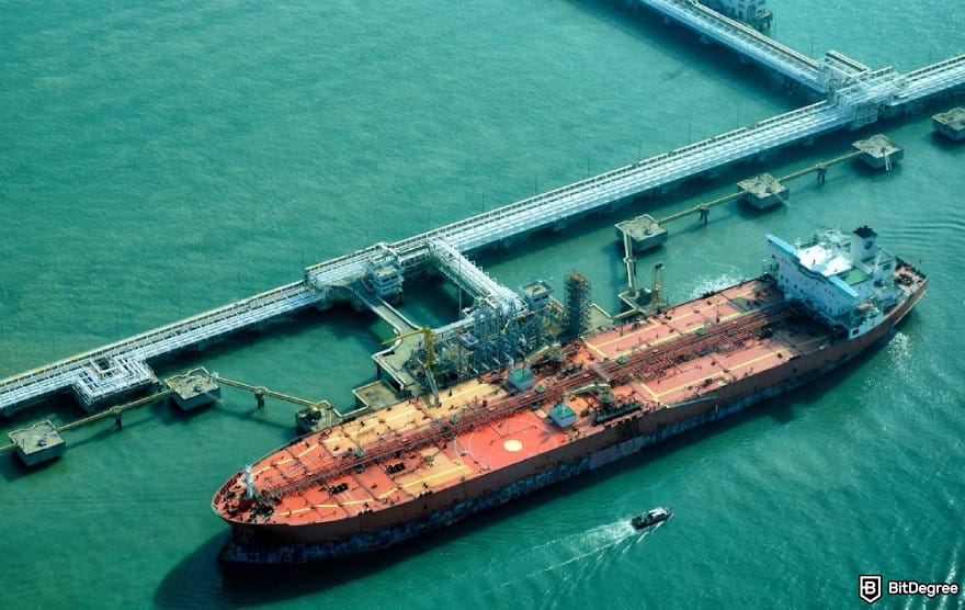How to trade commodities: an oil tanker at a refinery plant.