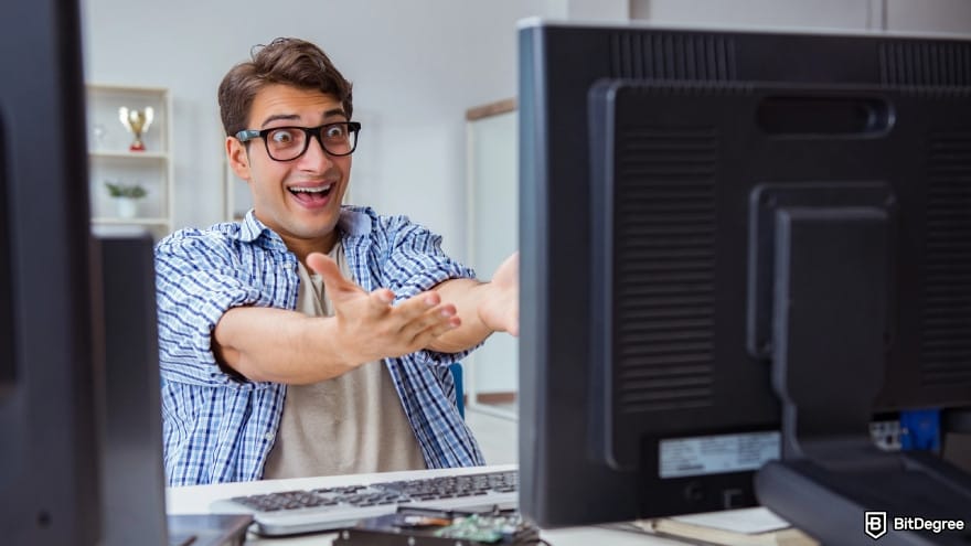 How to trade crypto futures: a trader monitoring markets on screens. How to trade crypto futures: a trader monitoring markets on screens.