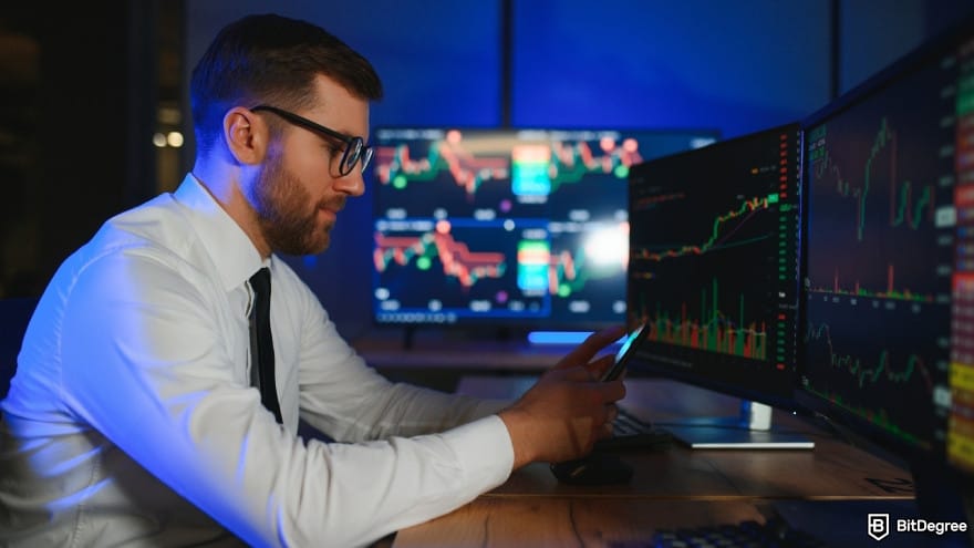 How to trade crypto futures: a trader working on a computer. How to trade crypto futures: a trader working on a computer.