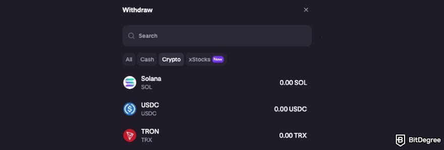 How to transfer crypto to bank account: Kraken asking you to select a cryptocurrency you want to withdraw.