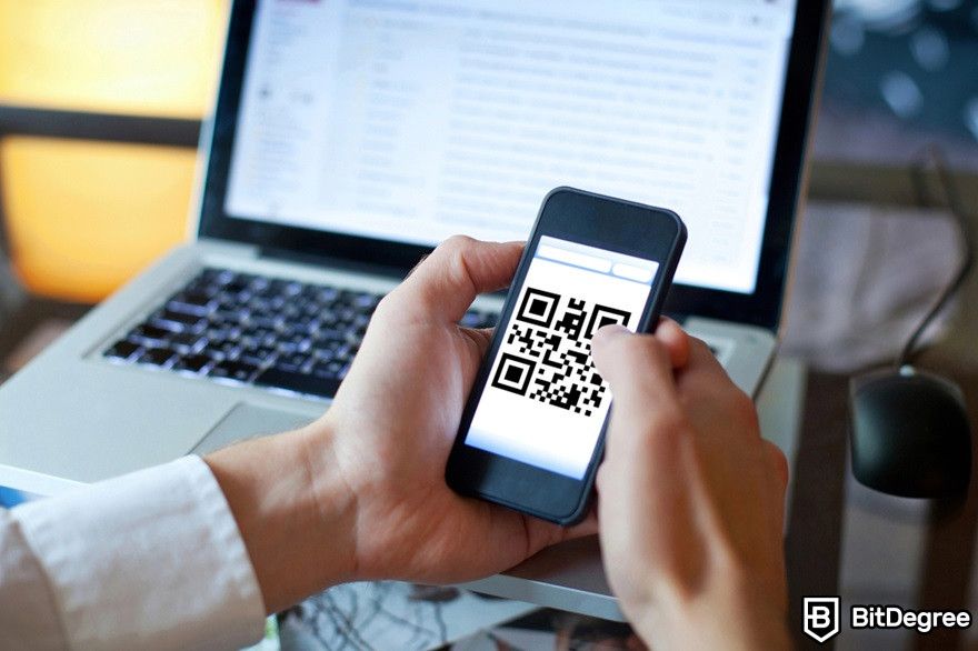 How to transfer crypto to bank account: a QR code on a phone.