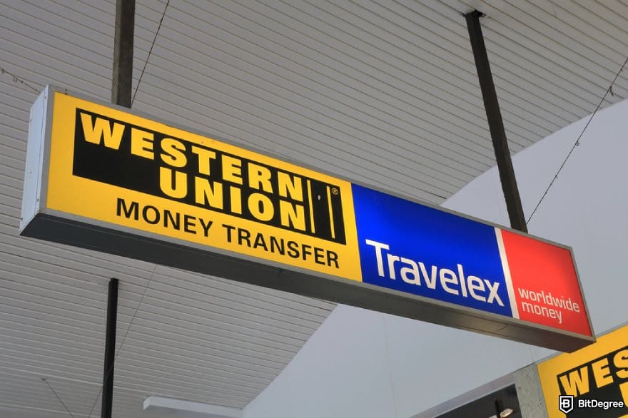 How to transfer money from one bank to another: the sign showing Western Union money transfer agent, Travelex and Worldwide Money.