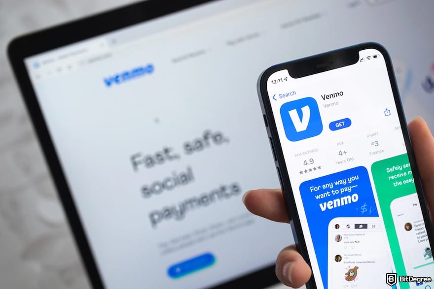 How to transfer money from Venmo to bank: a hand holding a mobile phone with the Venmo app in App Store displayed.