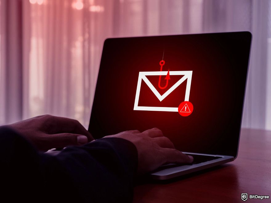 How to turn crypto into cash: a person on his laptop receiving phishing attack.