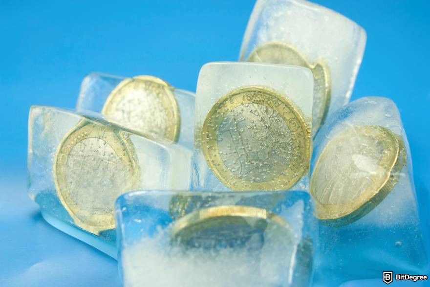 How to unfreeze cryptocurrency: coins in ice cubes.