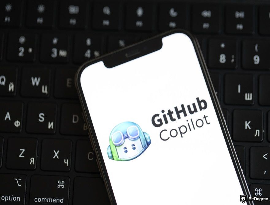 How to use AI for crypto trading: rthe GitHub Copilot logo on a phone.