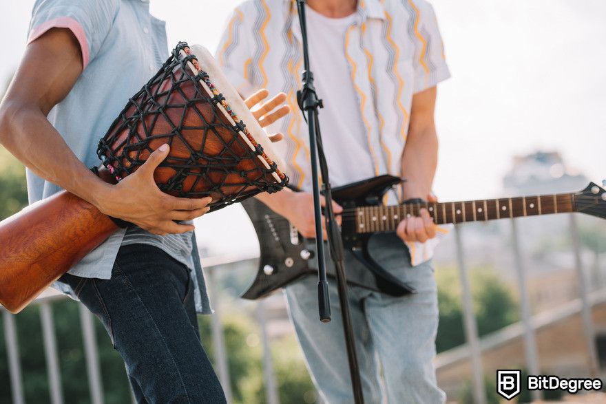 How to use ChatGPT: Two men playing music.