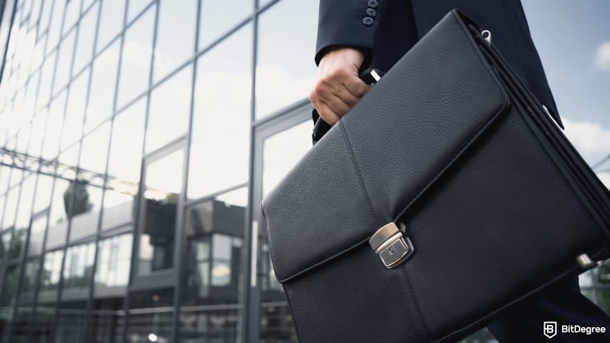 How to wire money: a man bringing a black briefcase.