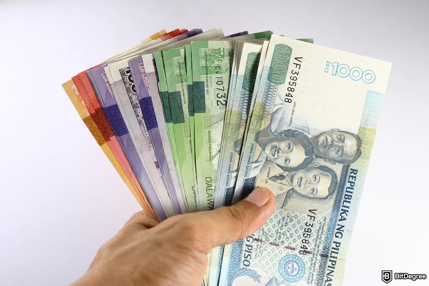 How to withdraw money from Binance Philippines: Philippine Pesos held in hand.