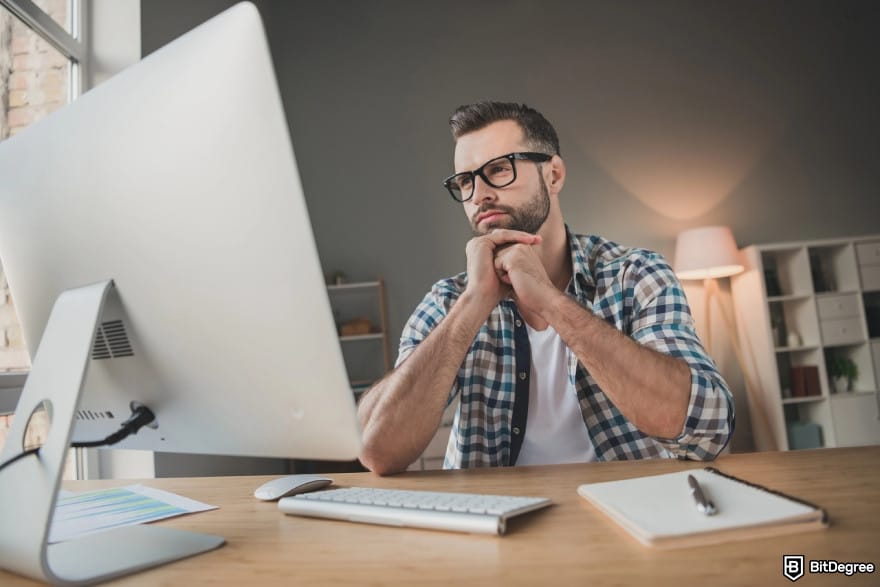 How to withdraw money from Binance Wallet: a person thinking thoroughly.