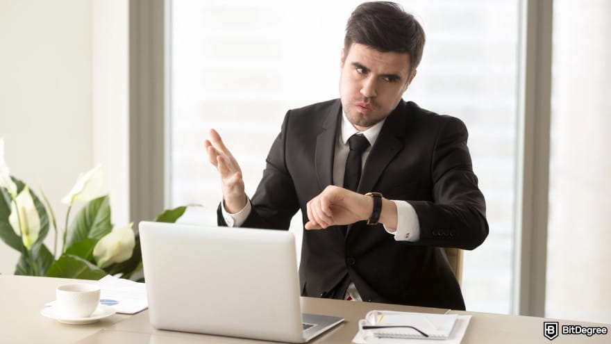 How to withdraw money from Binance Wallet: a person looks annoyed while waiting for something.