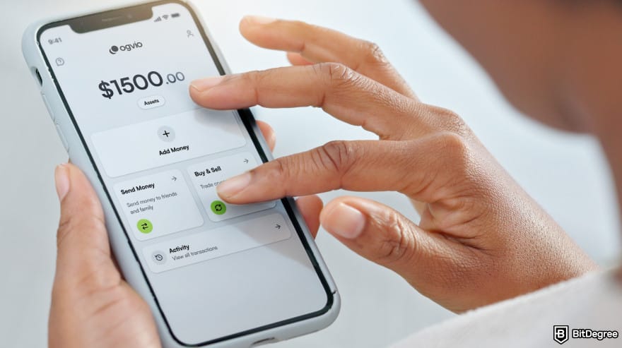 How to withdraw money from checking account: a person using Ogvio app on their phone. How to withdraw money from checking account: a person using Ogvio app on their phone.