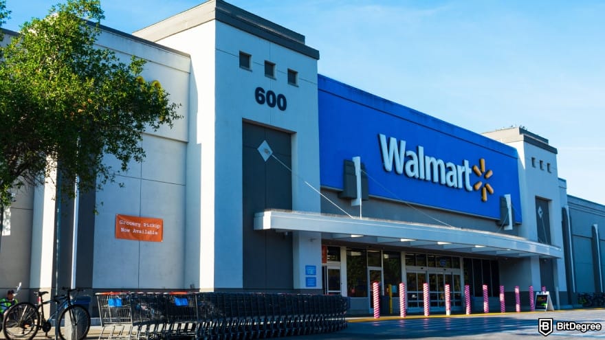 How to withdraw money from GO2bank without card: row of shopping carts in front of Walmart.