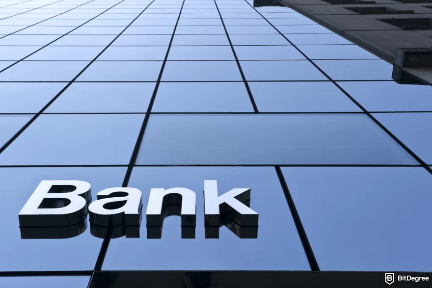 How to withdraw money from KuCoin: a bank building.