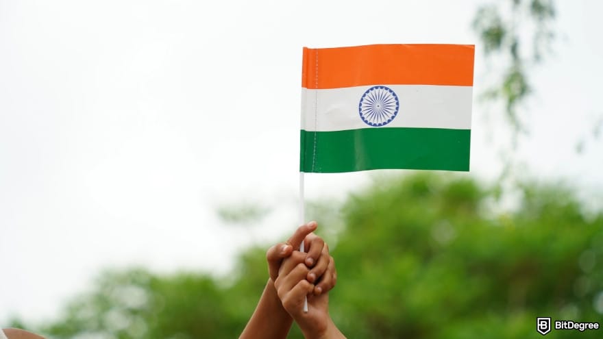 How to withdraw money from OKX in India: national flag of India isolated on sky background. How to withdraw money from OKX in India: national flag of India isolated on sky background.