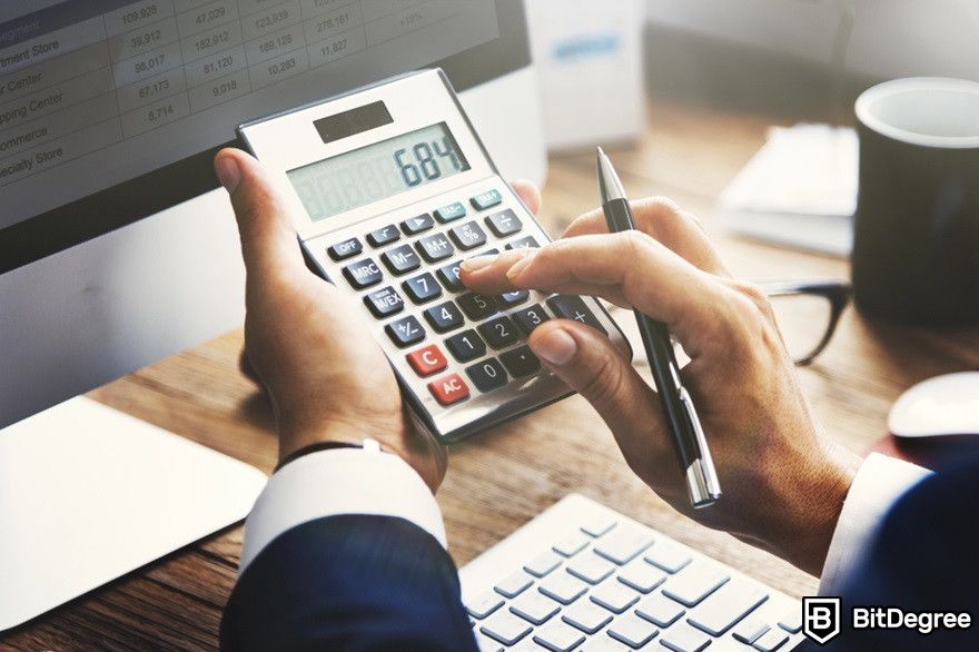 How to withdraw USDT to bank account: a man using a calculator.