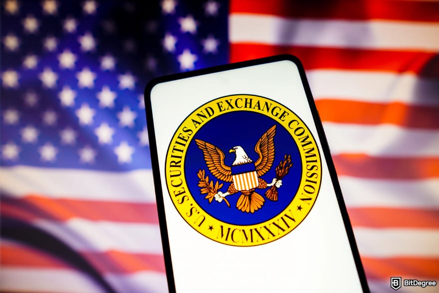 Is Bitcoin legal: the logo of SEC shown on mobile with the American flag backdrop.