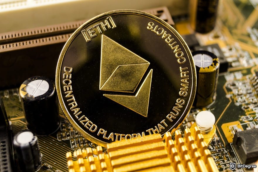 Is Cardano dead: a close-up of Ethereum coin resting on a computer motherboard.