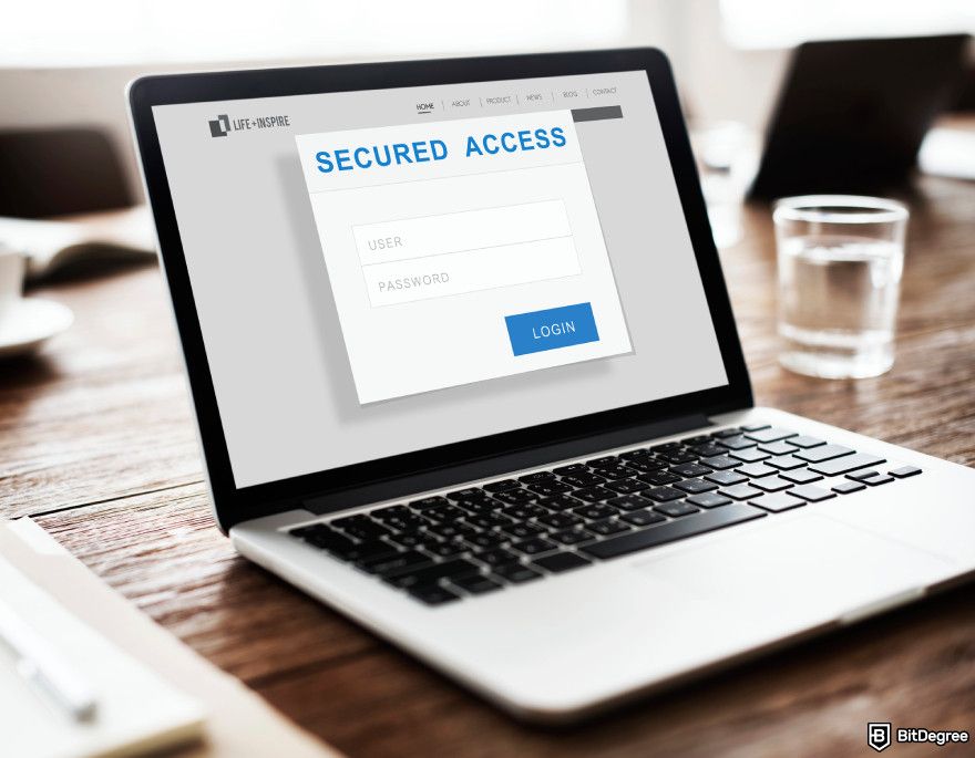 Is Coinbase safe: a laptop showing "Secured Access".