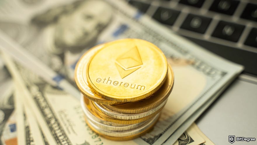 Is Ethereum dead: ETH coins on a dollars and on a laptop.