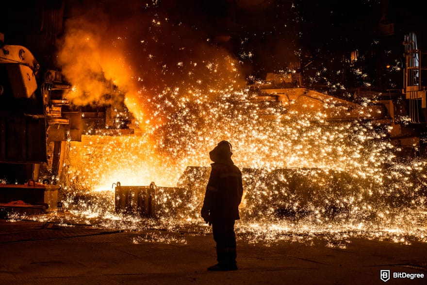 Is Ethereum dead: steelworker near a metal furnace.
