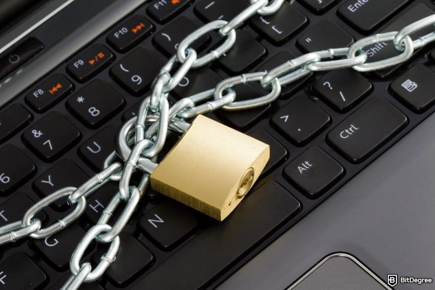 Is Kraken safe: laptop keyboard secured with chain and padlock.