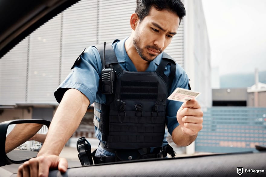 Is KuCoin safe: a police officer verifying an ID card.