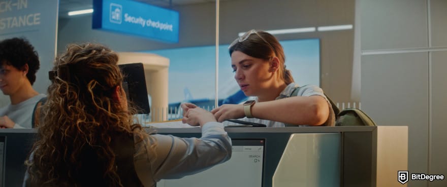 Is KuCoin safe: a woman undergoing identity check at an airport.