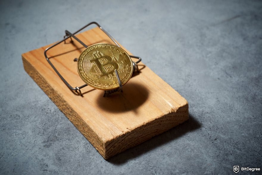 Is Robinhood safe: a BTC coin used as a bait for a mouse trap.