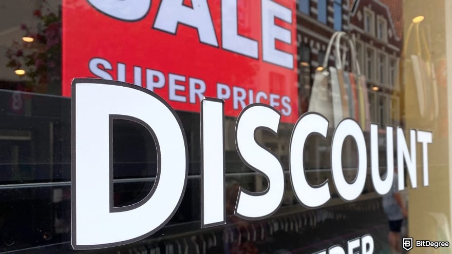 Is Wise available in the Philippines: view on storefront window with signs for discount.