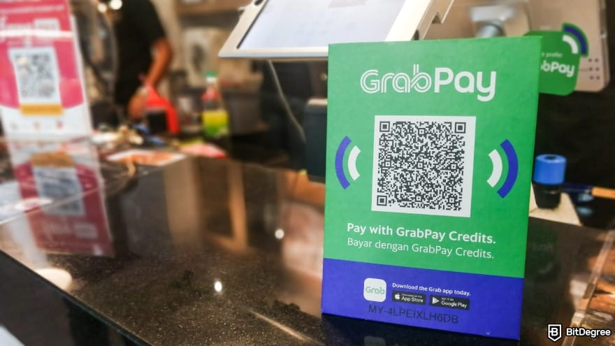 Is Wise available in the Philippines: retail outlet displaying signage of GrabPay.