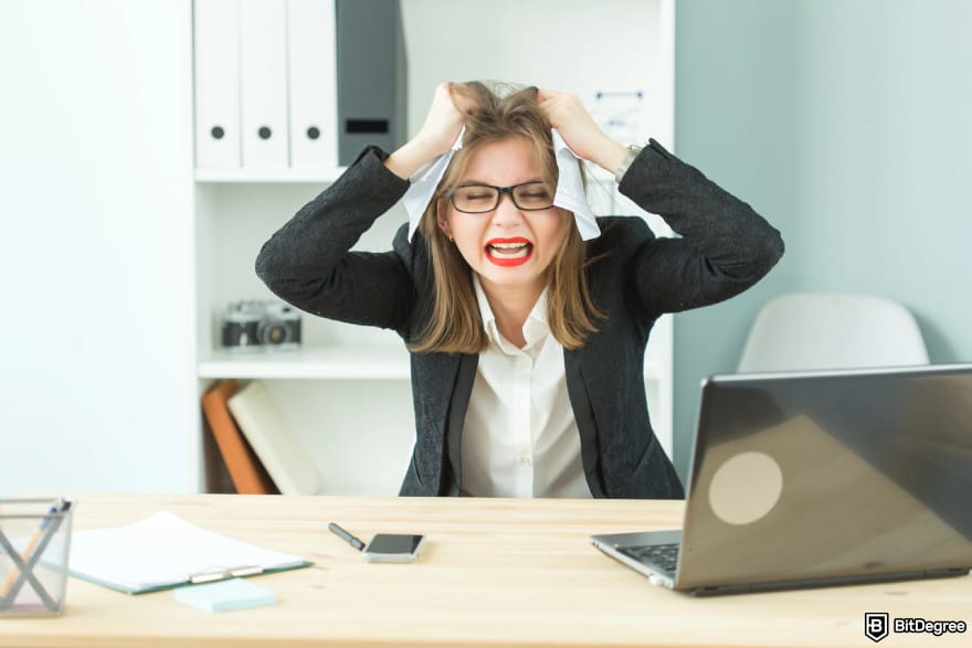KuCoin copy trading: a stressed woman.